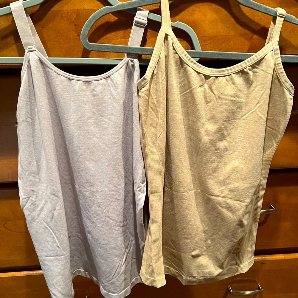 Maternity tank tops. White tank top is in L/XL and cream tank top is 1X/2X.